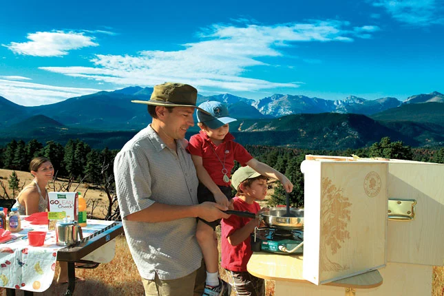 Unlike a cardboard box of kitchen gear, My Camp Kitchen gives you a place to prepare meals