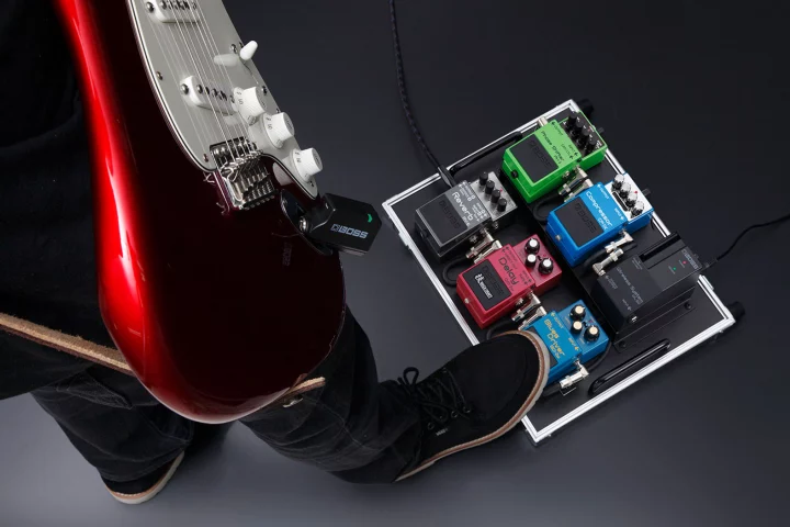 The Boss WL Series includes a pedalboard receiver dock for inclusion in a stomp chain, and connecting wirelessly using a transmitter plugged into a guitar