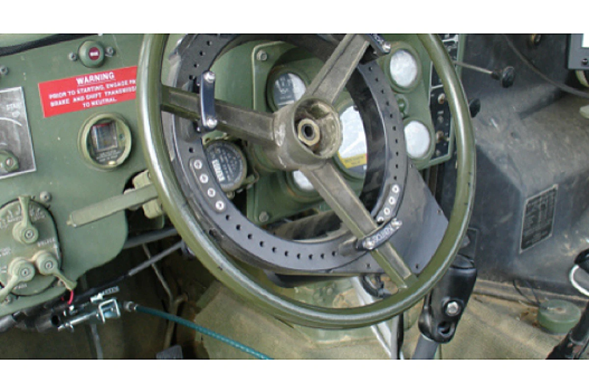 The Pronto4 installed on the steering wheel of a military vehicle