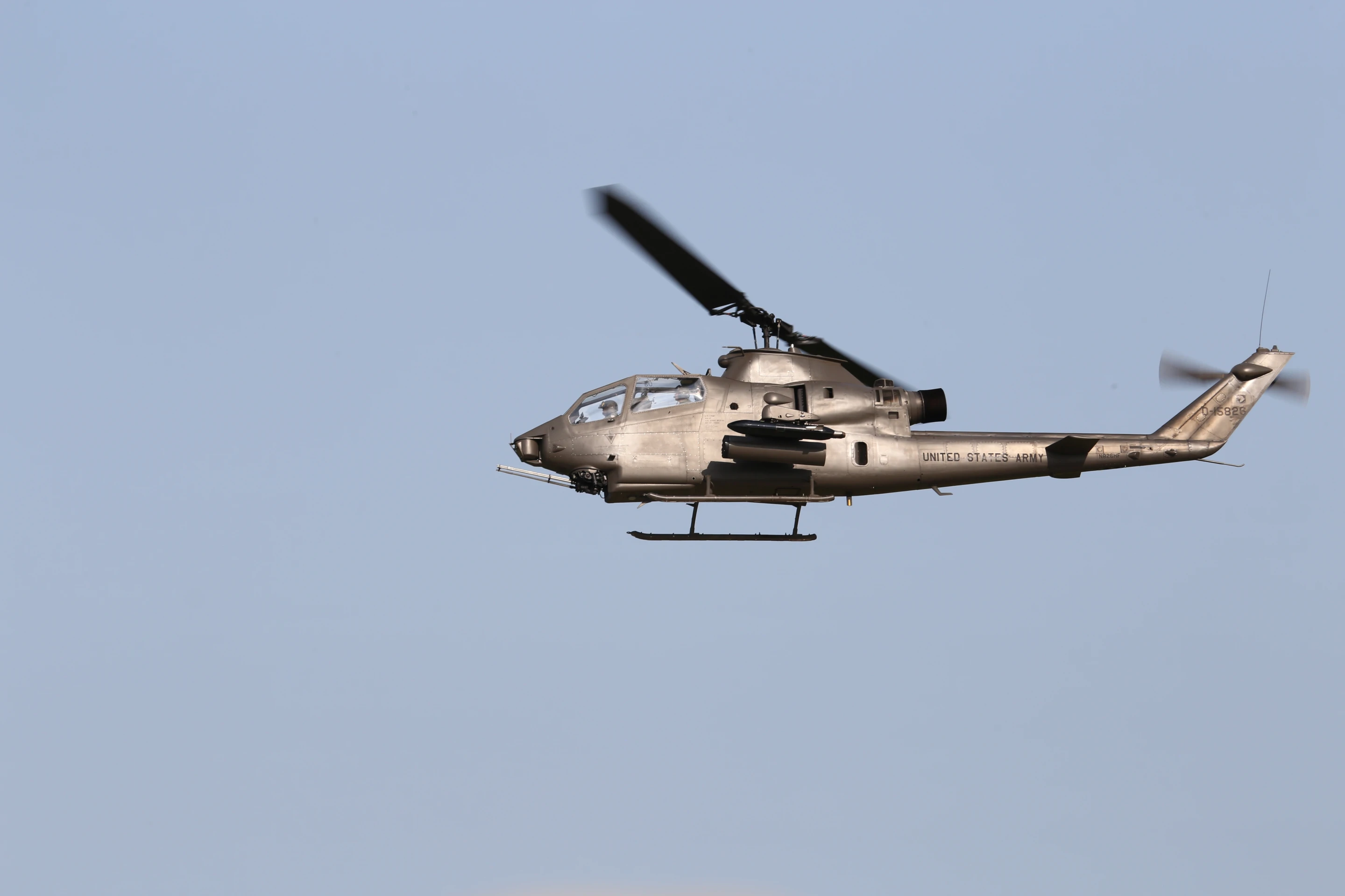 Vintage Cobra attack helicopter buzzing the airfield (Photo: Angus MacKenzie/Gizmag.com)