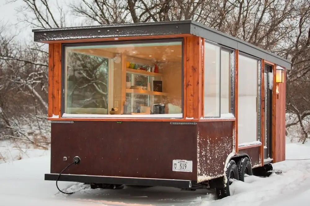 The Vista is clad in clear cedar siding and trim, with steel accent and protective panels