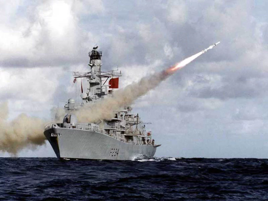 HMS Iron Duke firing a missile