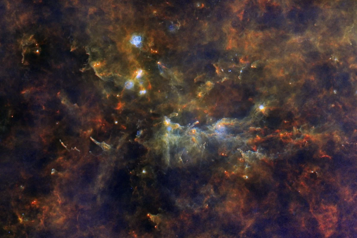 The star forming region is located 8,000 light-years away from Earth in the constellation Vulpecula