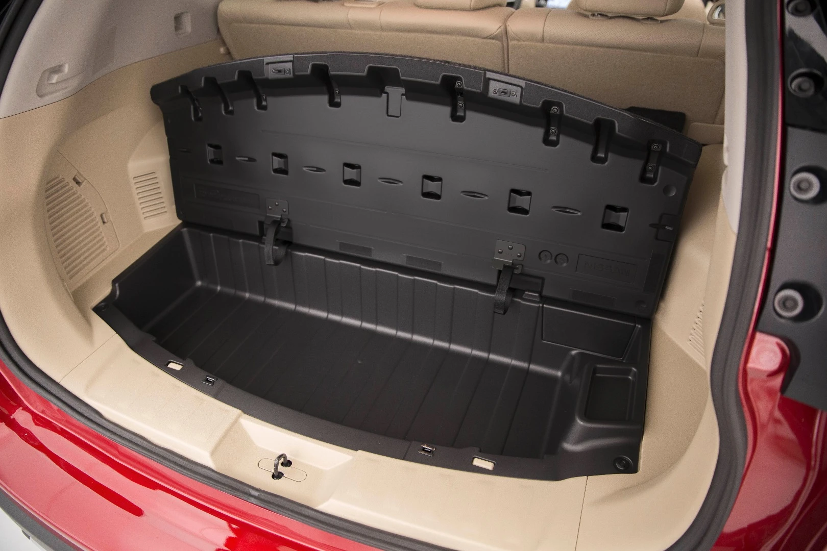 The cargo floor of the Rogue Hybrid has a lower compartment beneath the removable shelving that allows items to be "bucketed in" to keep them safe