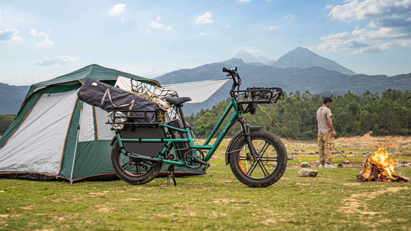 The suspension fork and chunky fat tires should help smooth the ride to camp