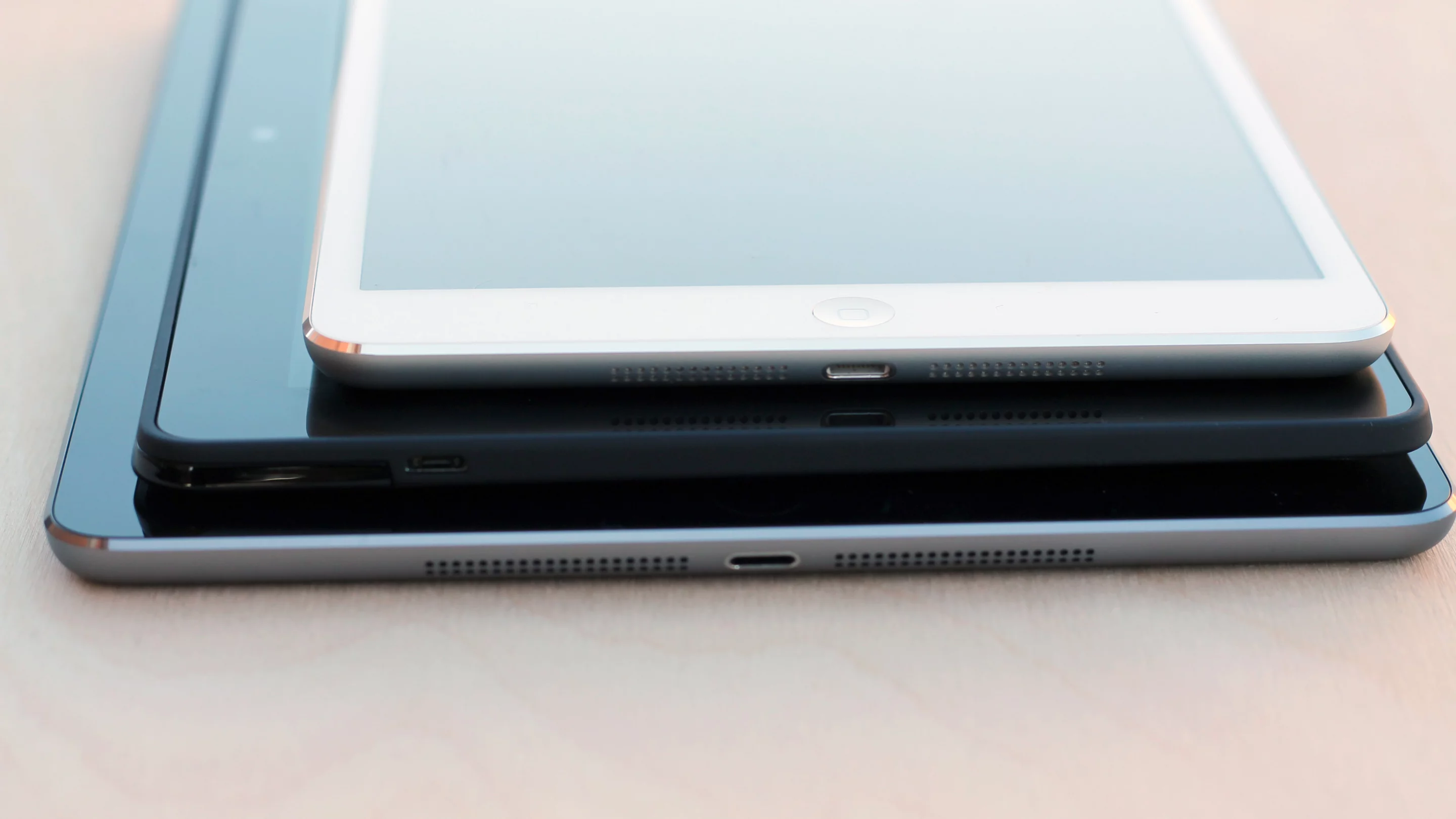 The iPads look and feel a bit higher-end, with their tight aluminum construction