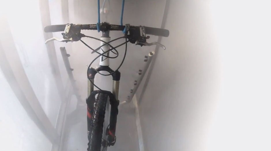 Two parallel rows of nozzles rise up from the floor of the machine, gently spraying both sides of the bike first with water containing eco-friendly detergent, and then with fresh rinse water