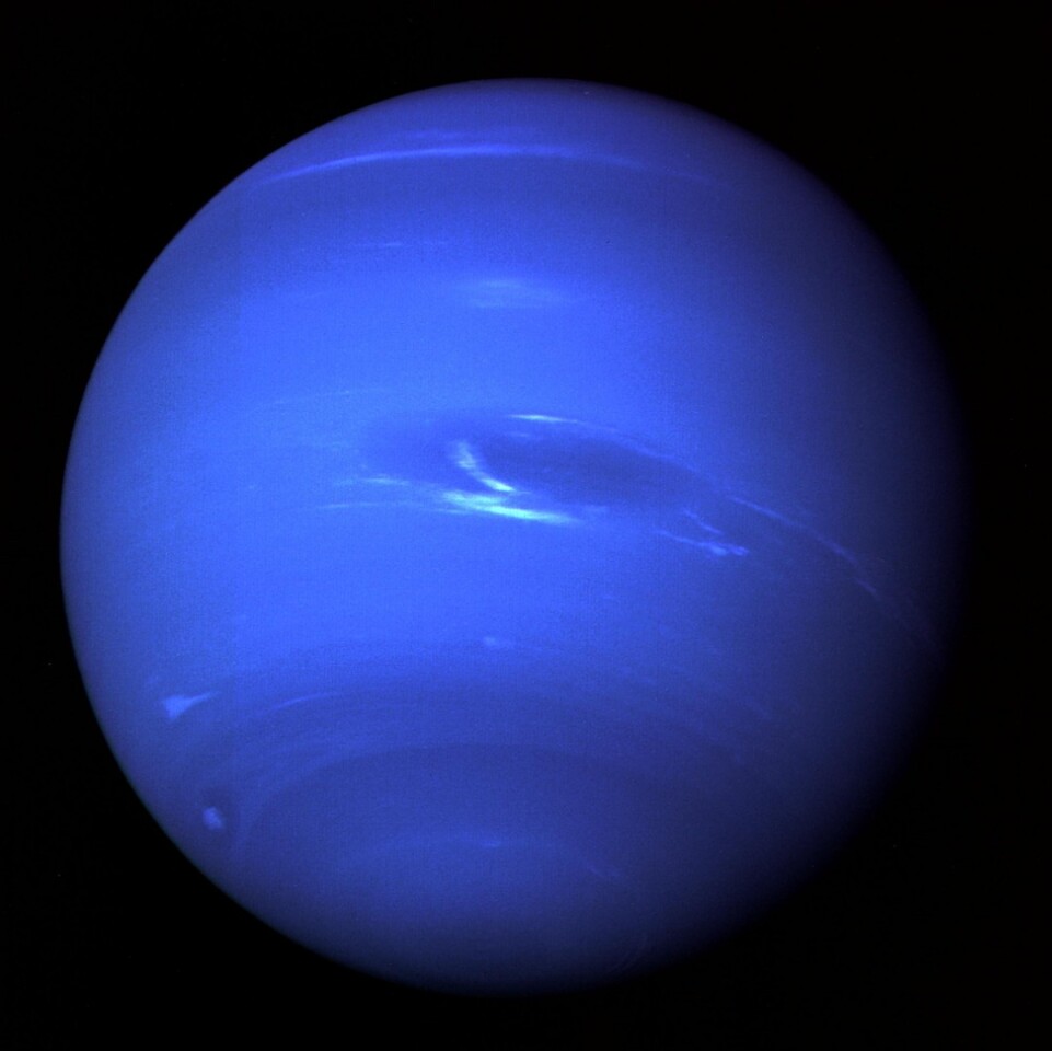 A composite image of Neptune taken by Voyager 2 in 1989, with the "Great Dark Spot" visible in the center