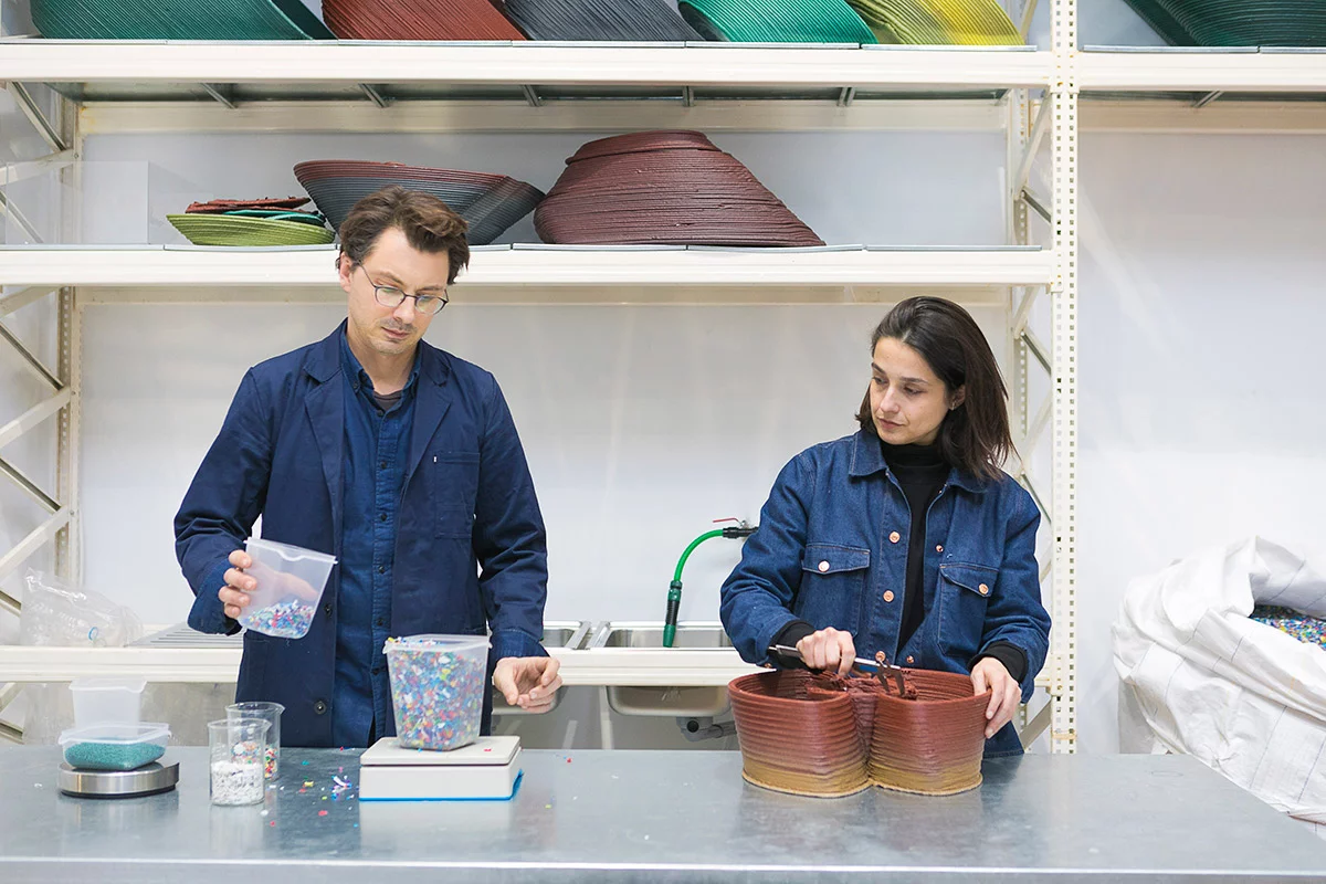 New Raw's robotic arm 3D printer uses waste plastic pellets (left) to make functional street furniture (right)