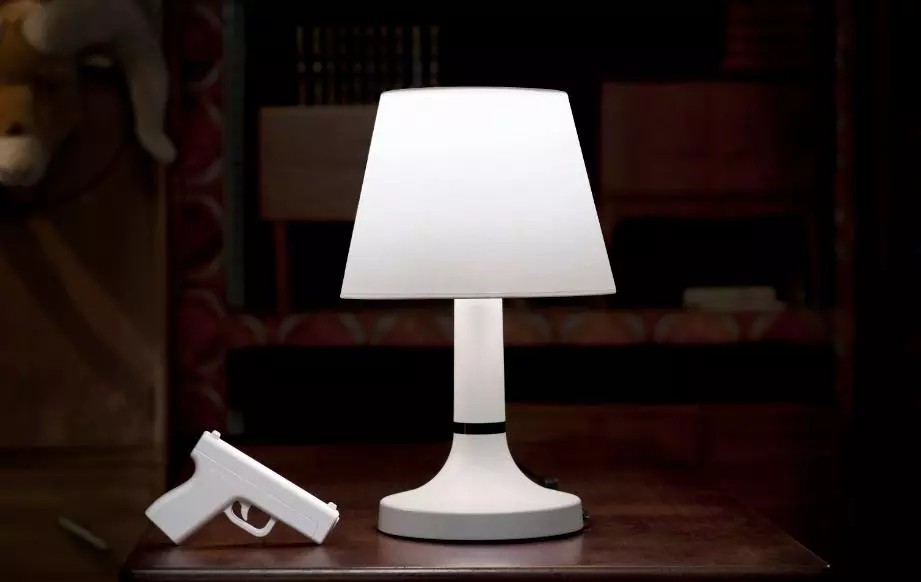 Keep the remote control gun by your bedside and you'll never have to get up to shut off the light