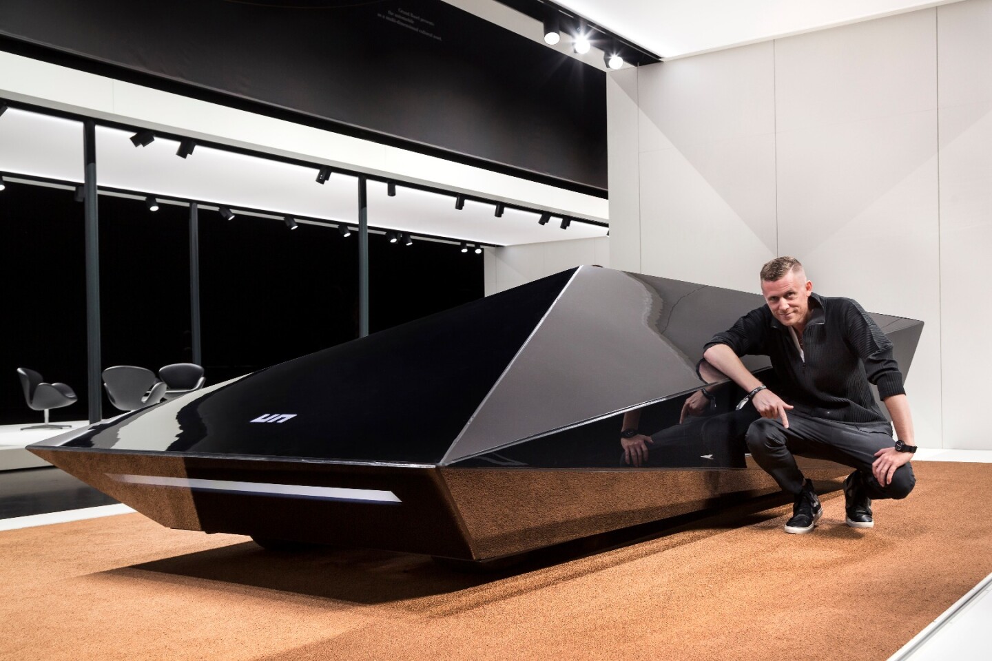 Designer Rem D. Koolhaas showed a new Lo Res car at the announcement of Grand Basel. The first Lo Res car was created by Koolhaas for his United Nude fashion brand, by abstracting the polygonal form of a Lamborghini Countach into a minimalist wedge shape.