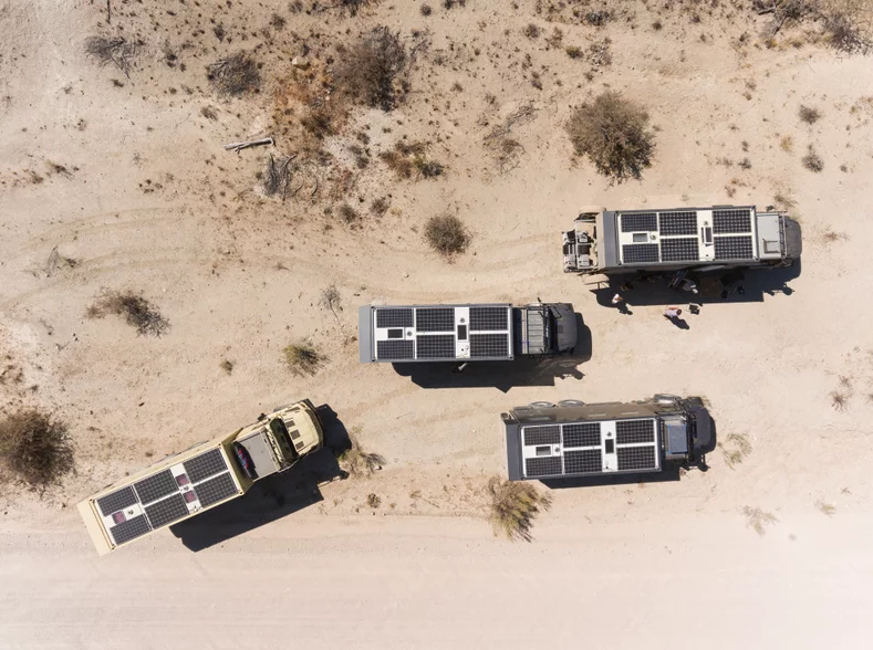 A herd of Bliss Mobils collects solar while heading into the wild