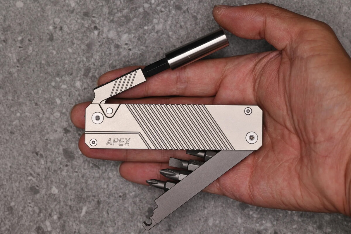 Slim multi-magnet tool stows swappable bit sleeves for different jobs
