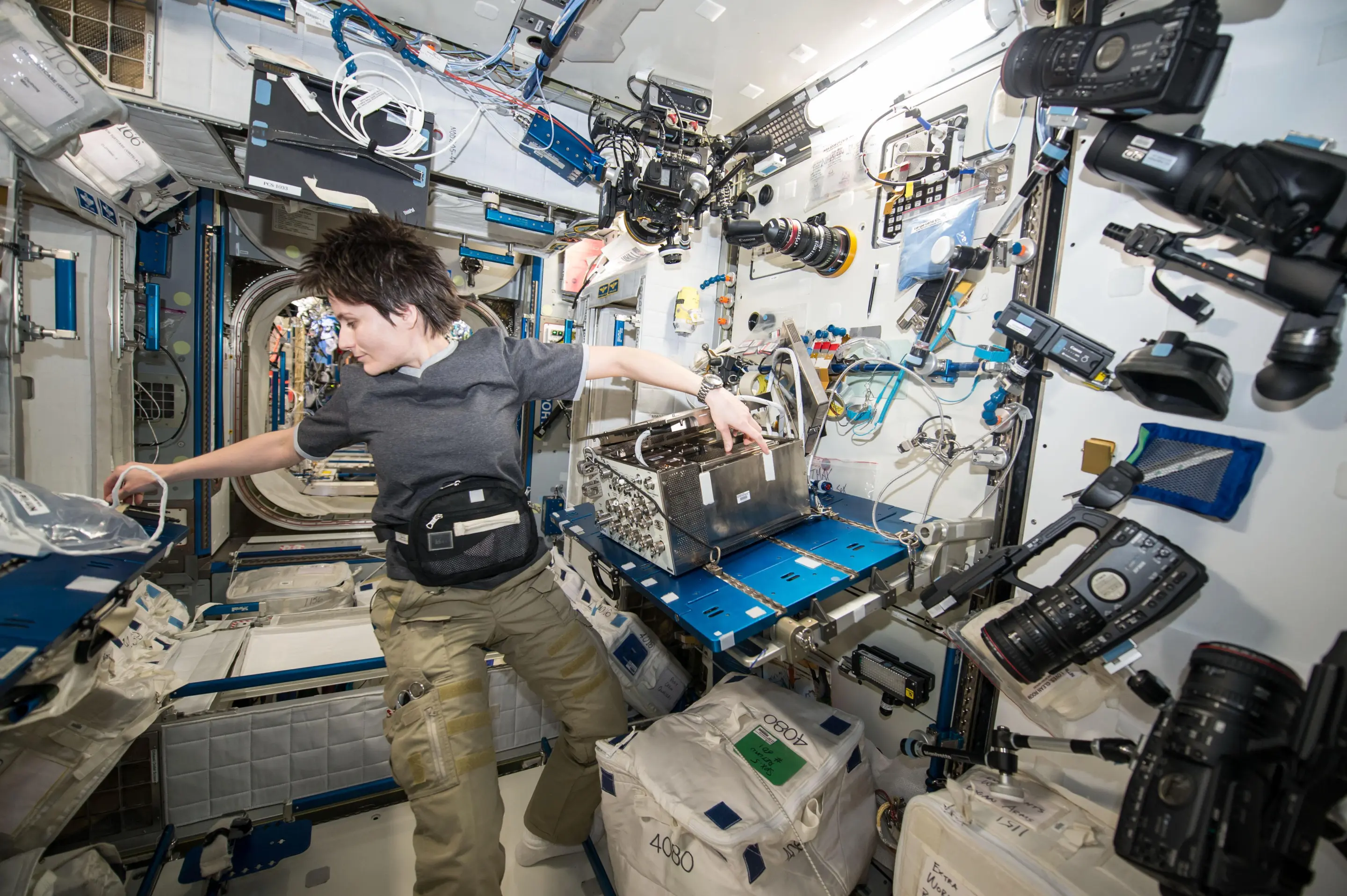 ESA astronaut Samantha Cristoforetti working with equipment for the Airway Monitoring investigation (Photo: ESA/NASA)