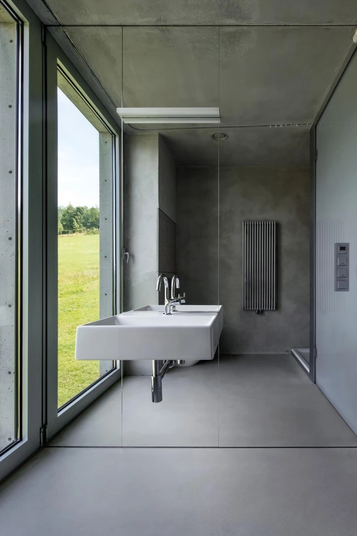 This stunning concrete house by award-winning Polish firm KWK Promes was conceived by practice head Robert Konieczny as his own home