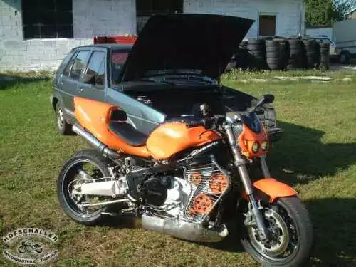 The Dieselfighter is a Volkswagen Golf 1600cc engine in a Kawasaki frame. Probably the fastest diesel motorcycle on the planet right now.