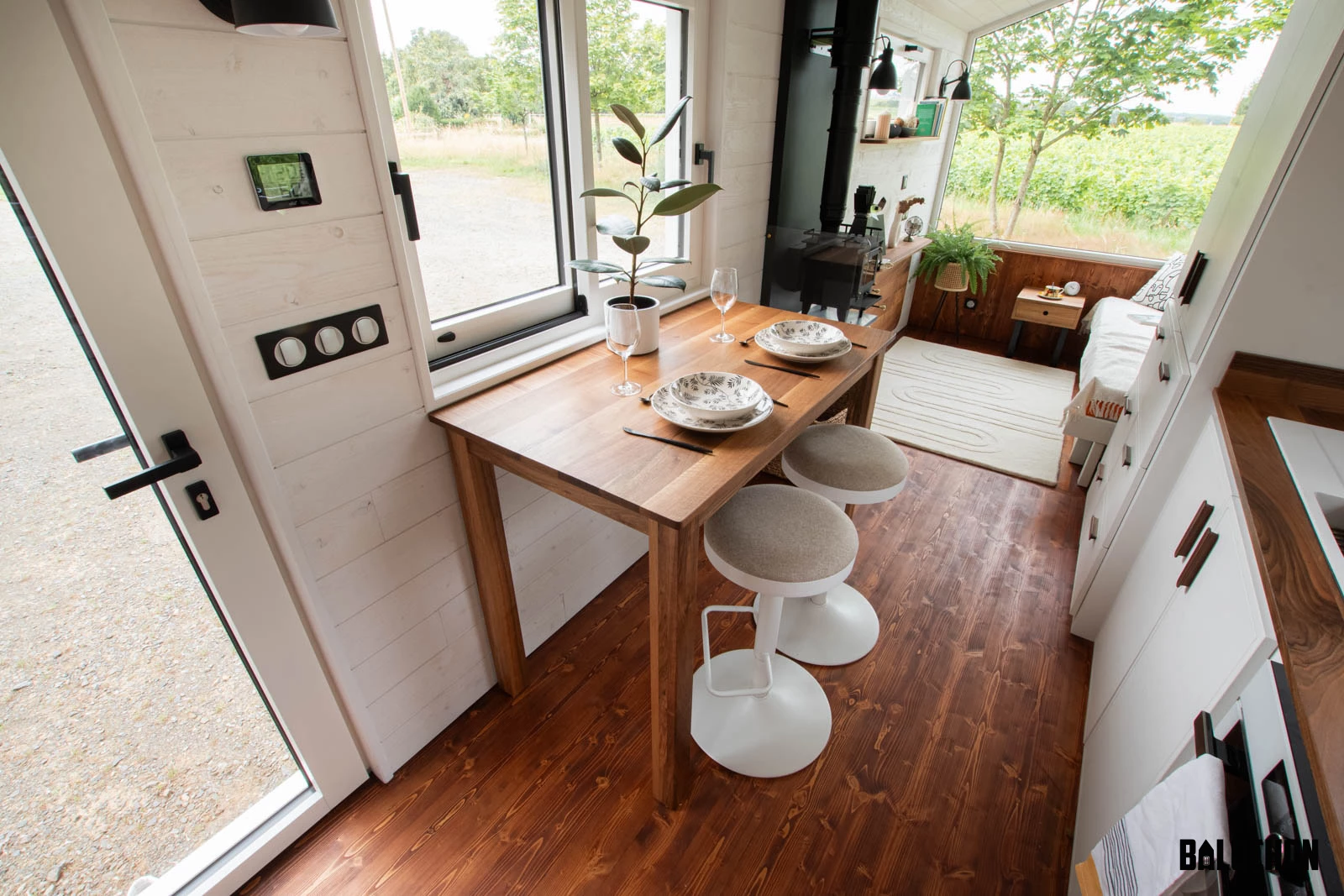The Moulinsart's kitchen includes a dining table for two people