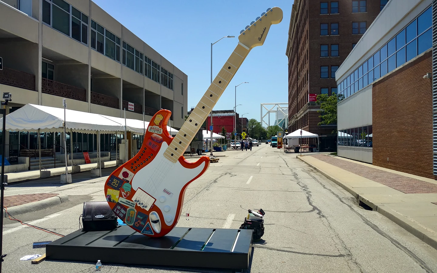 The 12 foot, 500 lb guitar installation was positioned at the main entrance of the Boulevardia festival in Kansas City