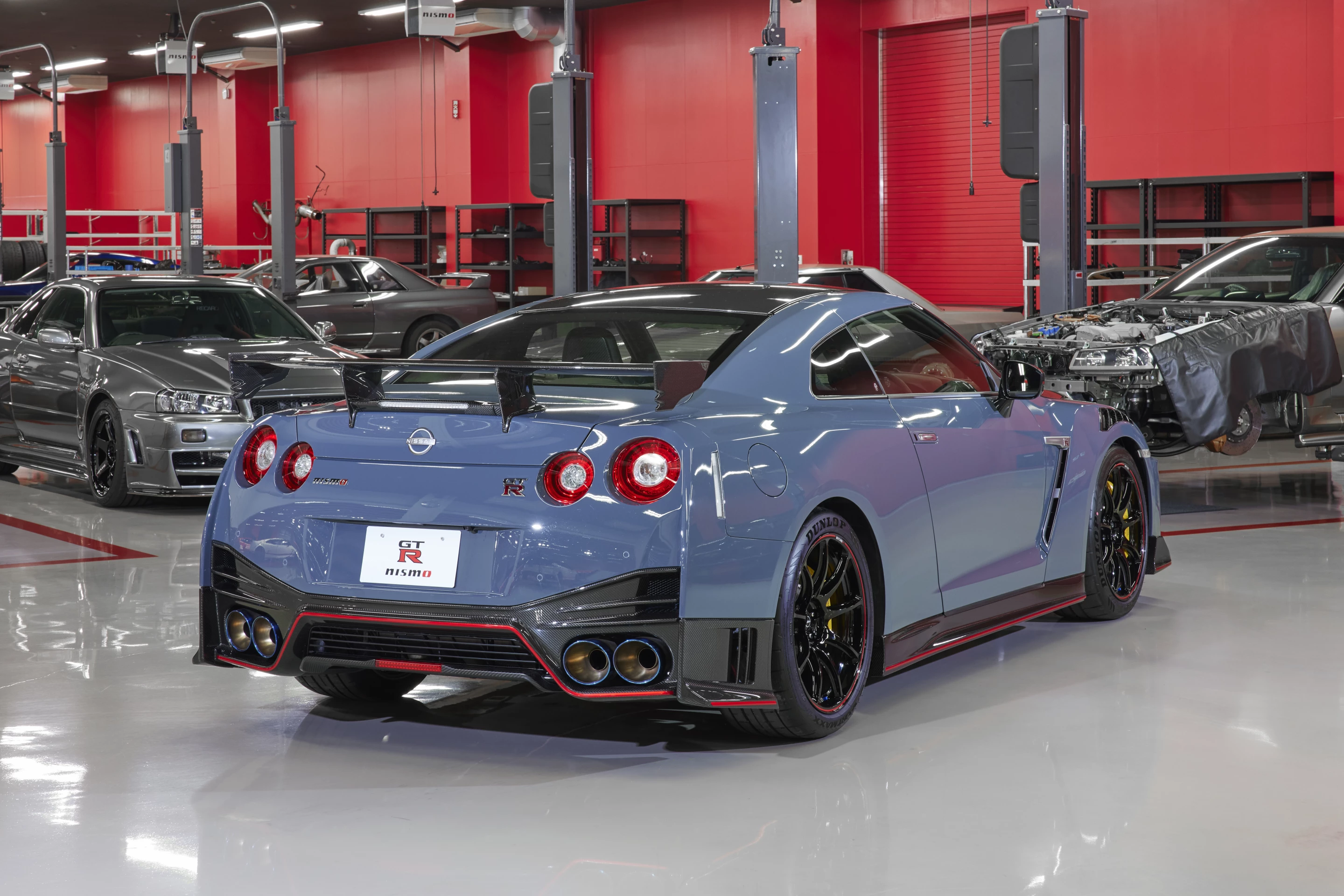 The edition-exclusive 20-inch Rays aluminum forged wheels sport a red accent that matches existing accents around the body