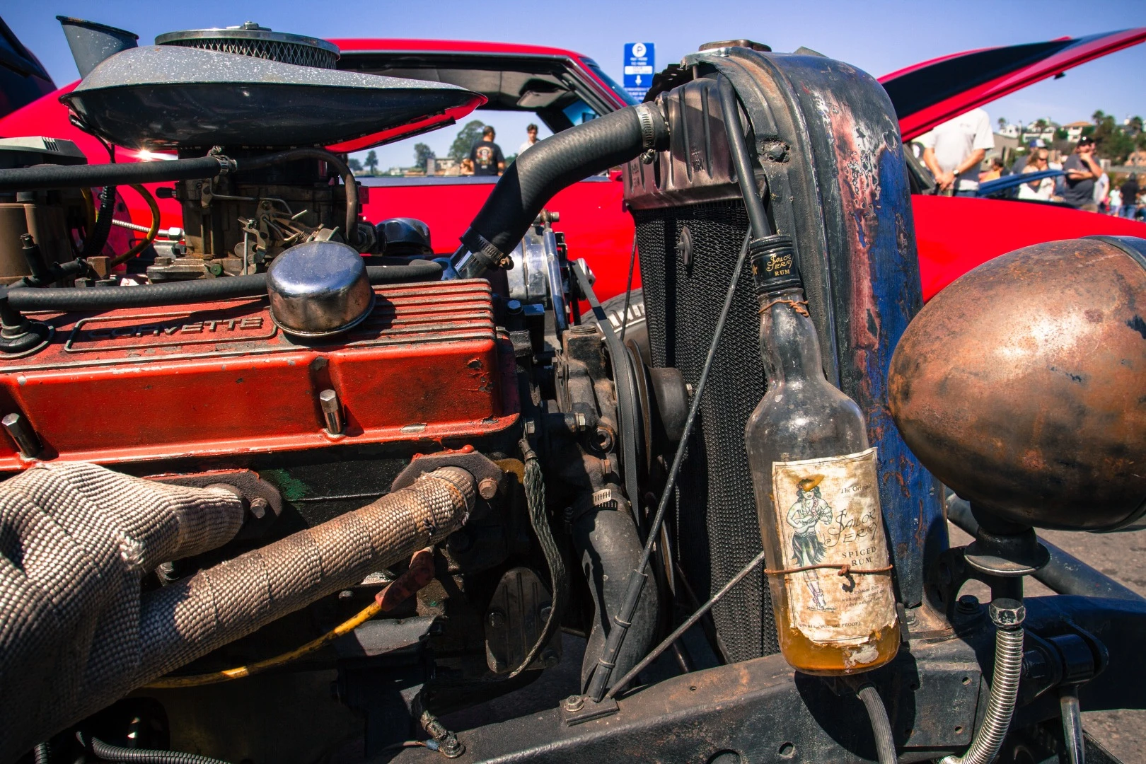 This 1934 Ford Pickup isn't much older than the Sailor Jerry spiced rum bottle used as an overflow catch bottle
