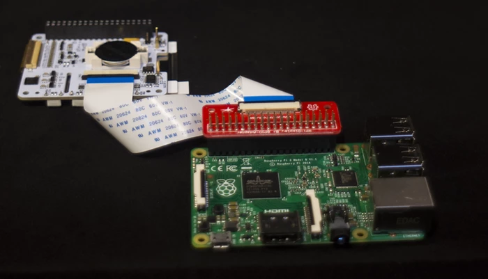 The back side of PaPiRus with an optional FPC GPIO breakout
