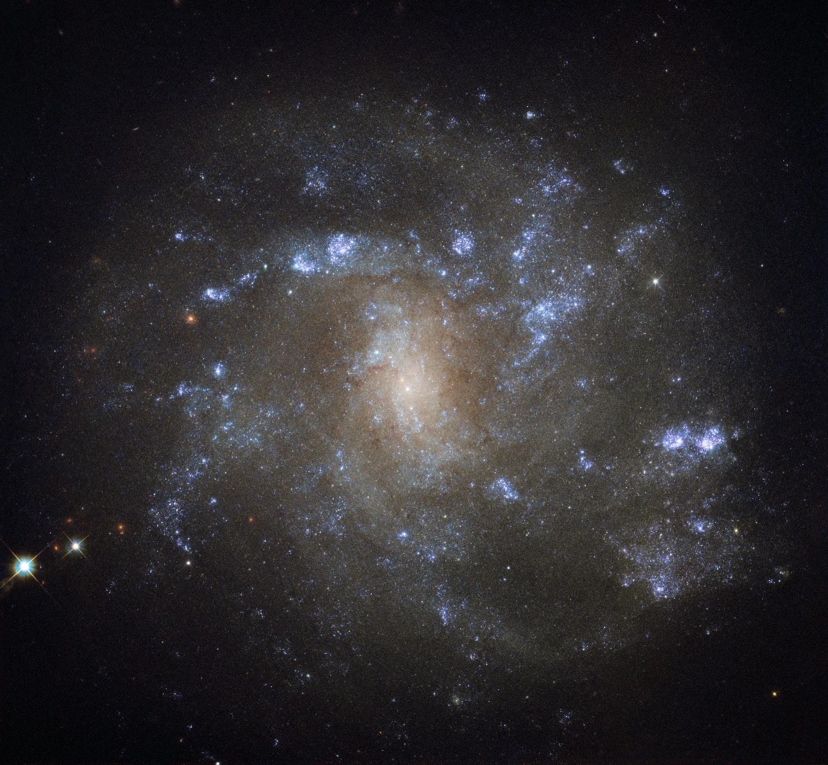 NGC 2500 lies about 30 million light-years away in the northern constellation of Lynx