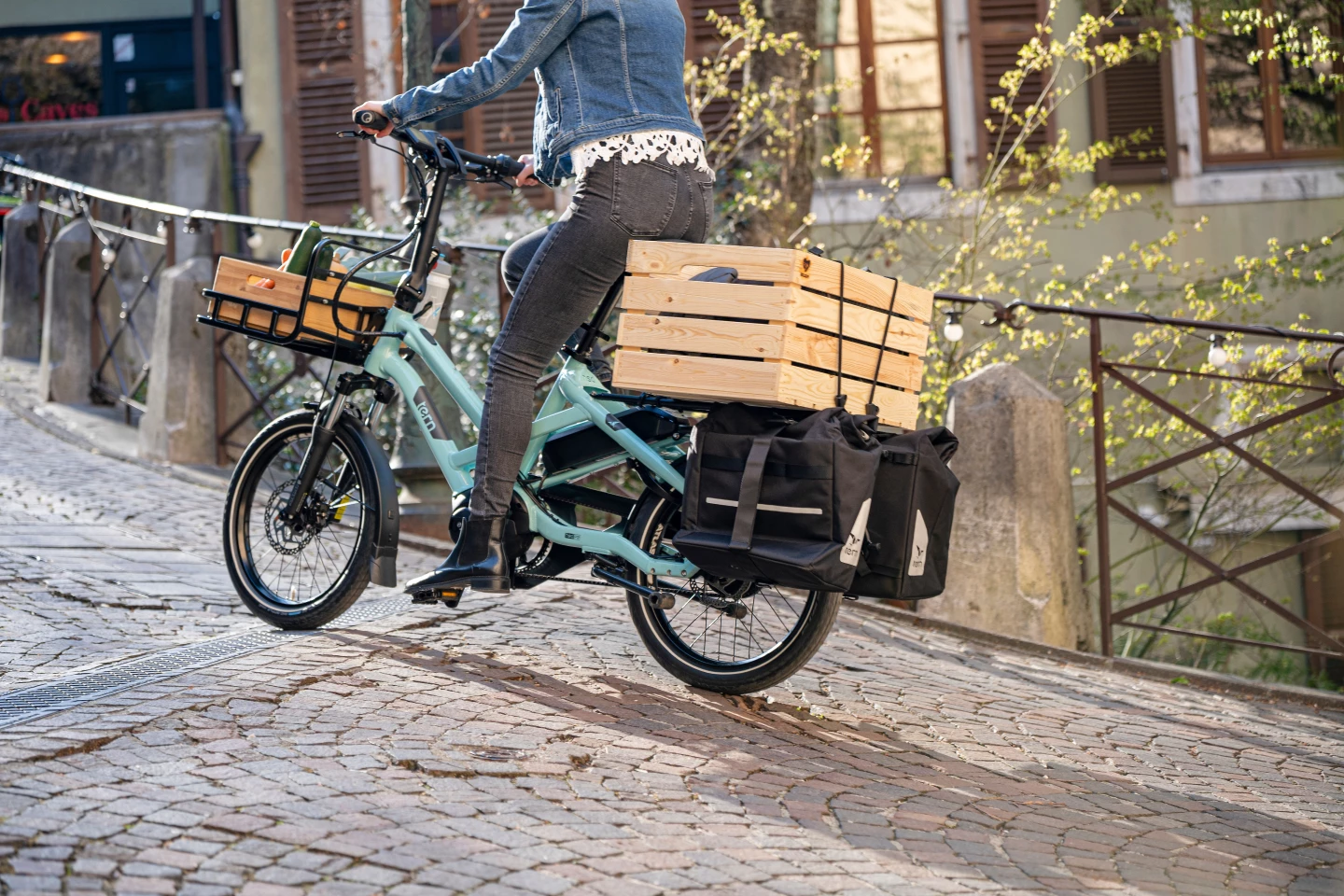 The rear rack is rated for 80 kg of cargo, the front rack/basket is optional
