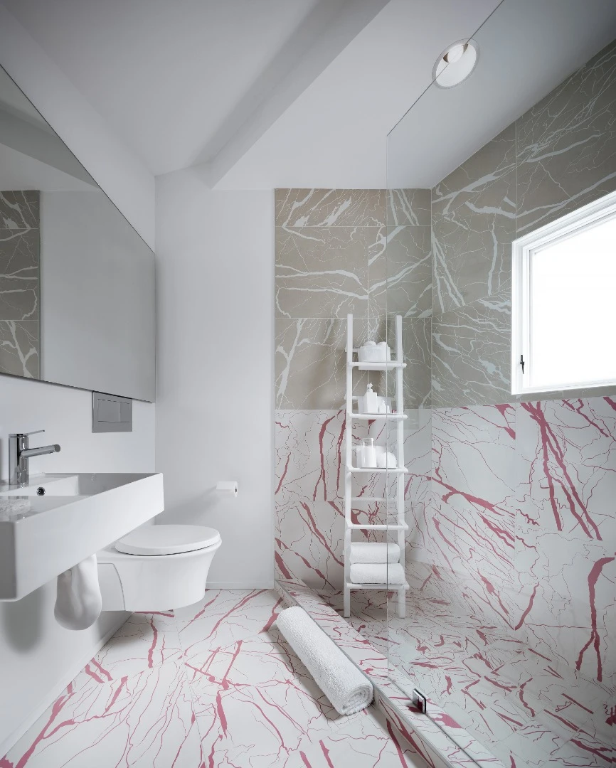 Faux marble tile finishes in the bathrooms