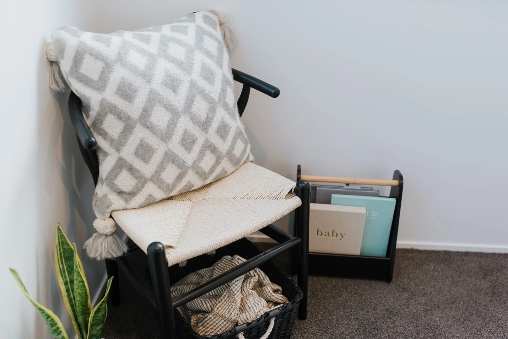 The Dance Tiny House's living room includes a chair