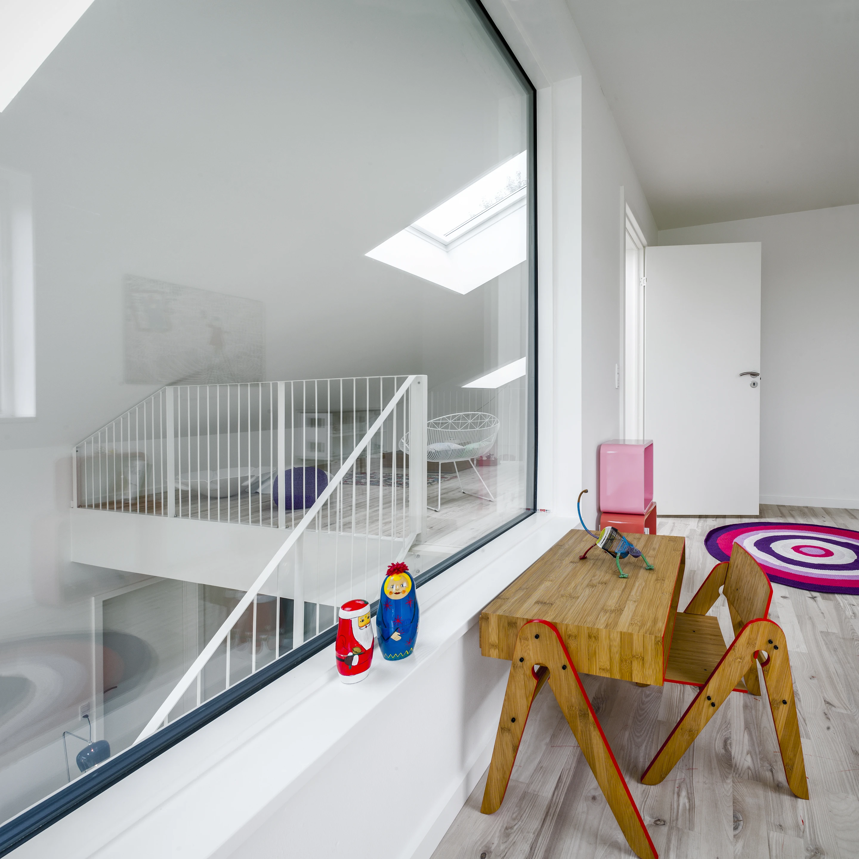 WFH House features a living space, kitchen and four rooms that can be used as bedrooms, a workspace or as a recreation retreat
