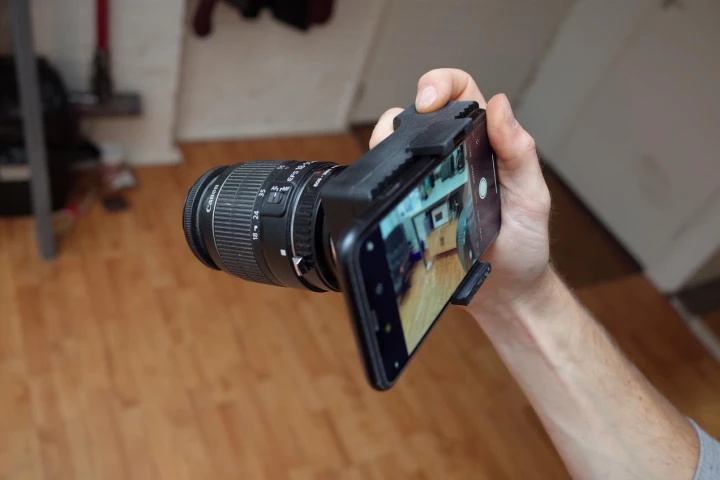 The smartphone mounted to the back of the Alice Camera module serves as a real-time viewfinder and settings control