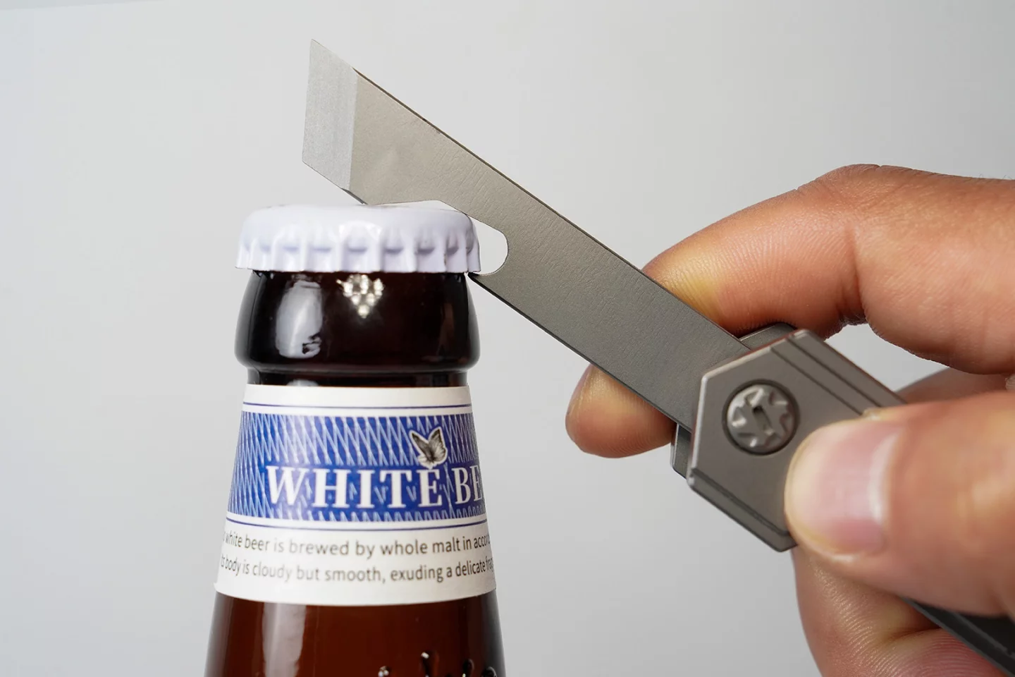 The pry bar has a built-in bottle opener