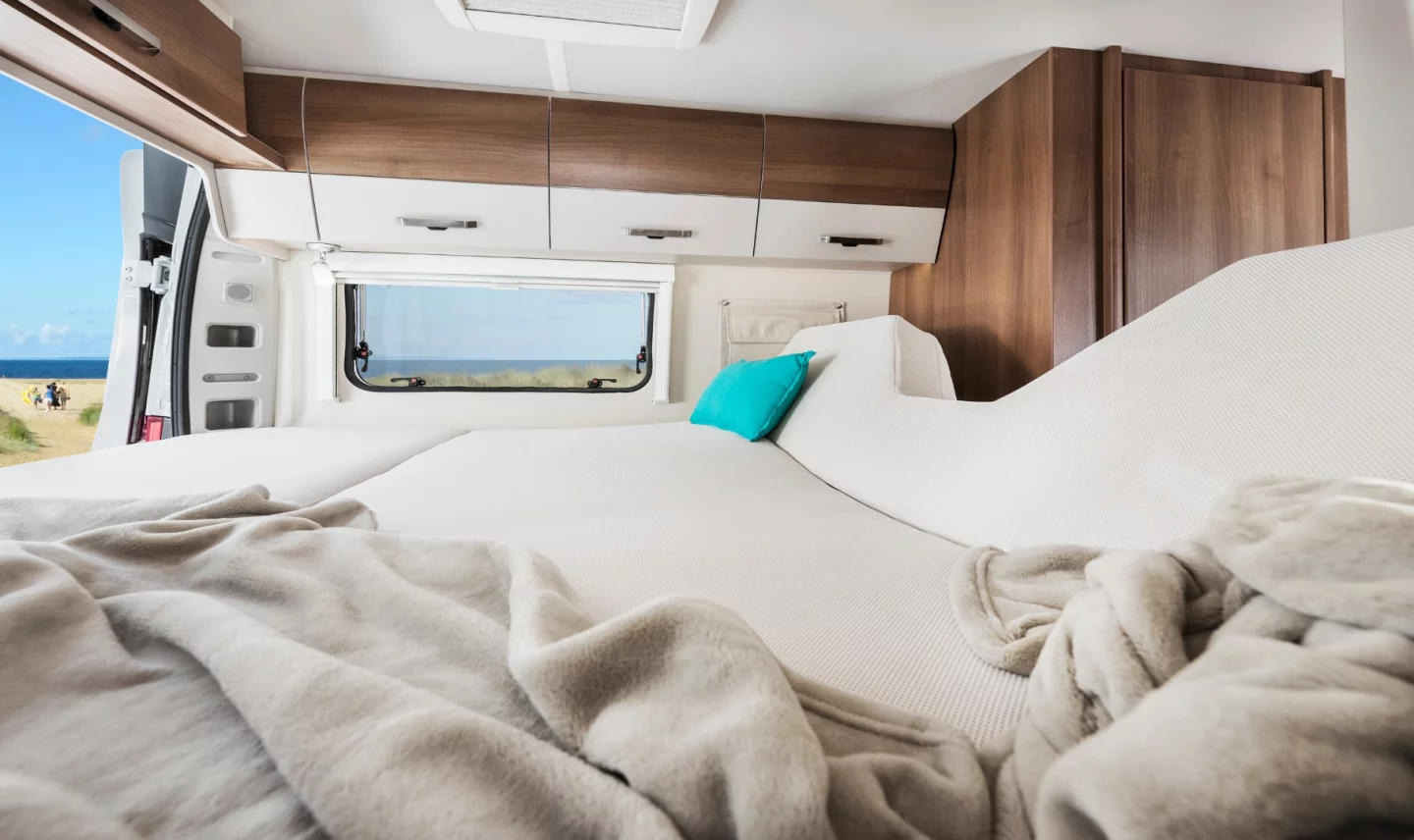 Lift the foot of the 600 and 630 L rear bed and you have a sofa lounge that looks out the rear doors, taking in the local views