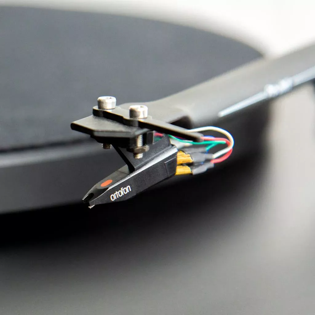 The Andover-One E sports a custom Pro-Ject turntable up top, and ships with a pre-adjusted counterweight and an entry-level Ortofon cartridge