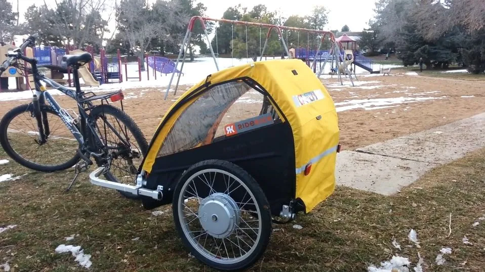 The electric motor-powered Ridekick Child Trailer