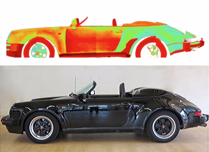 Significant repairs are evident in the door and the rear of the front left quarter panel of this Porsche