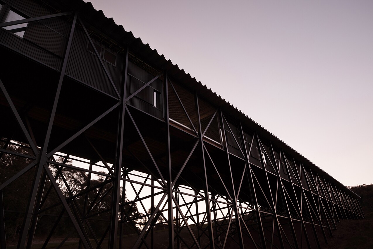 The striking new museum stretches across the gully and is built to resemble a trestle bridge