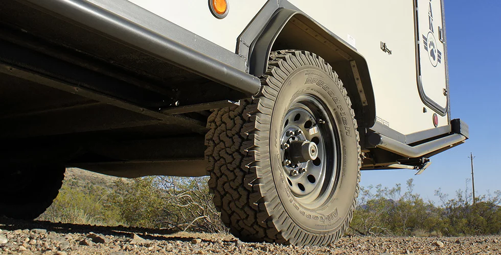 The ADAK trailer has all-terrain tires and eight-lug wheels