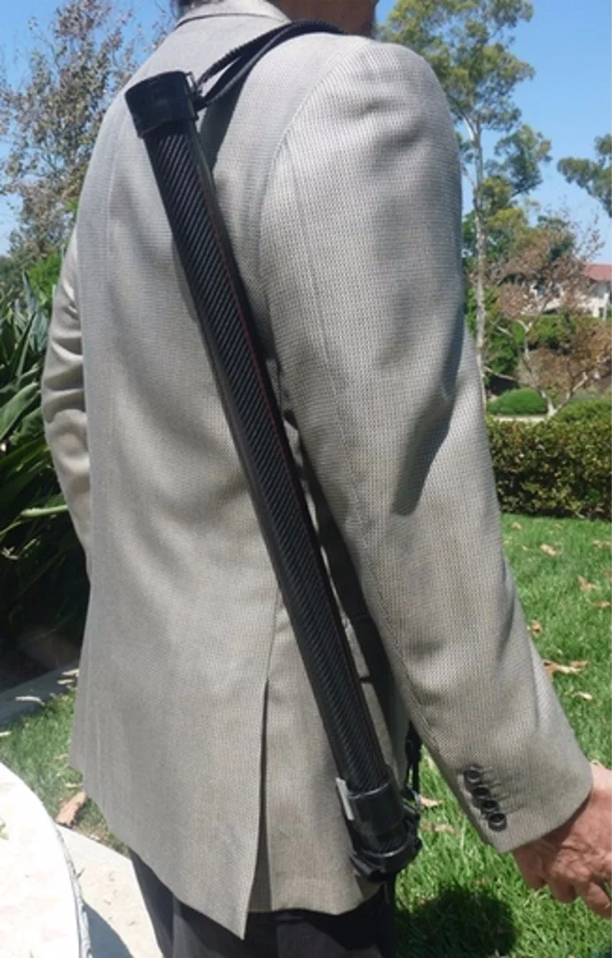 The RainBender secures with a shoulder stap