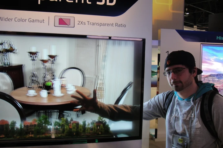 Gizmag's Dave LeClair, demonstrating the transparent 3D TV
