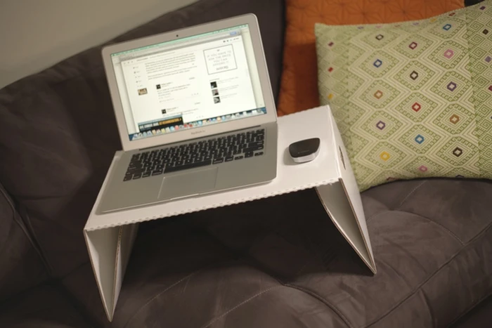 Lapdeck can be used on the sofa, taking the heat and weight off of your legs