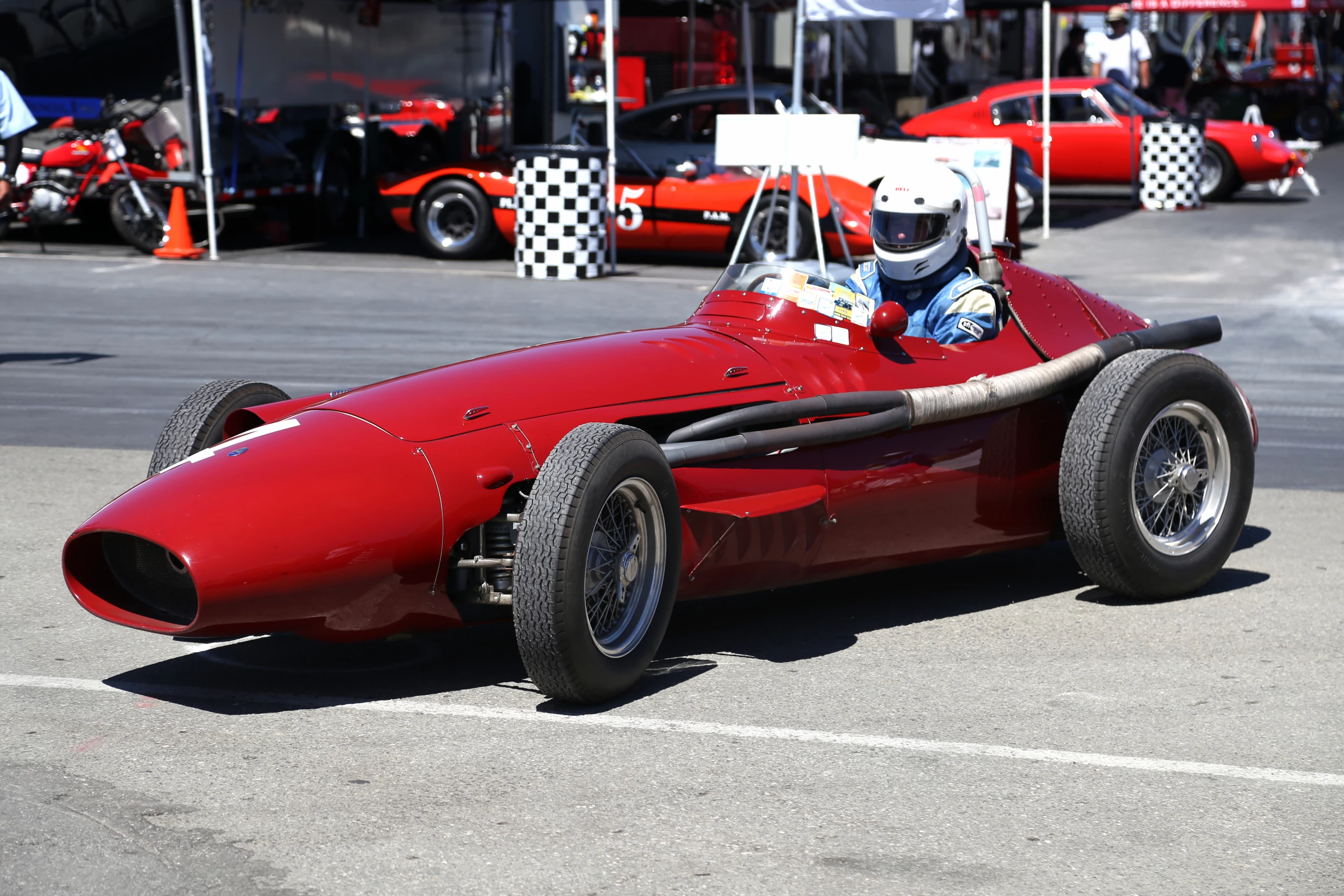 A Maserati 250F coming off the track was one of many on hand to celebrate the marque's 100 year anniversary (Photo: Angus MacKenzie/Gizmag.com)