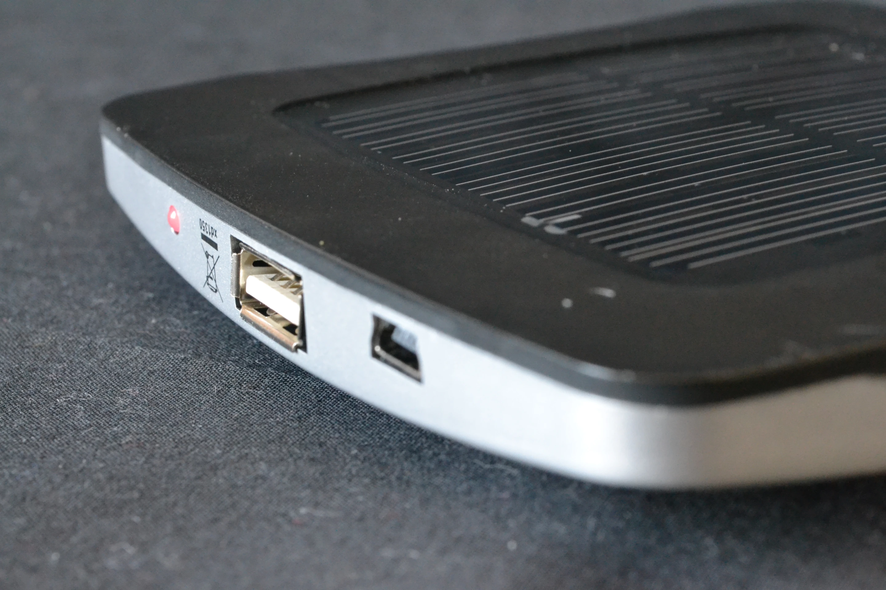 There's a full-size USB port for dumping charge onto a connected device at 5 V (500 mA) and a mini-USB port to charge up its own battery in about three hours