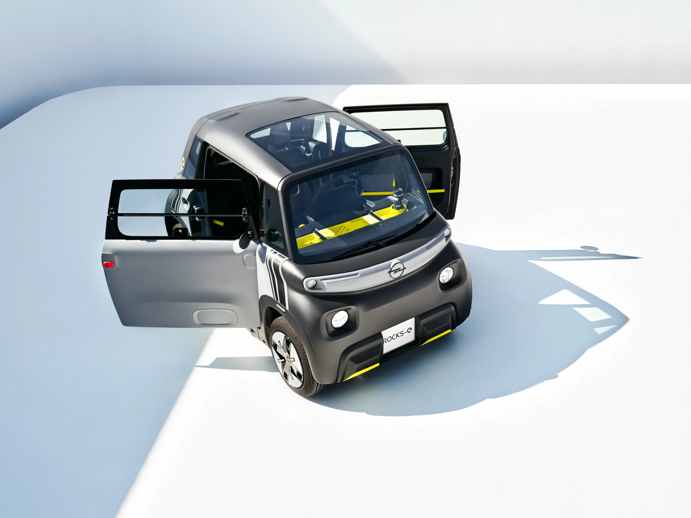 The driver door opens in the opposite direction to the passenger door