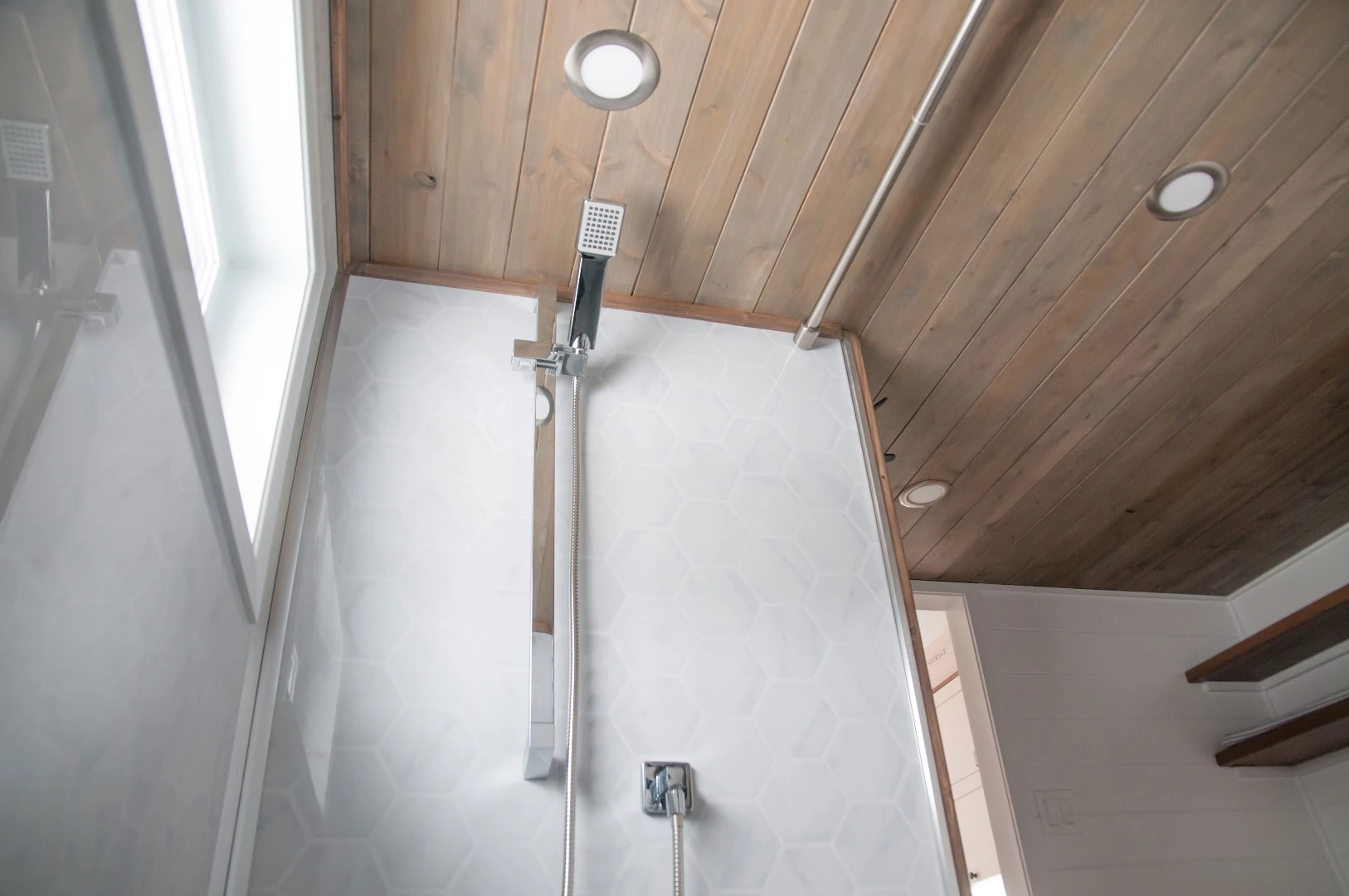The Ébène's bathroom includes a bath/shower and composting toilet