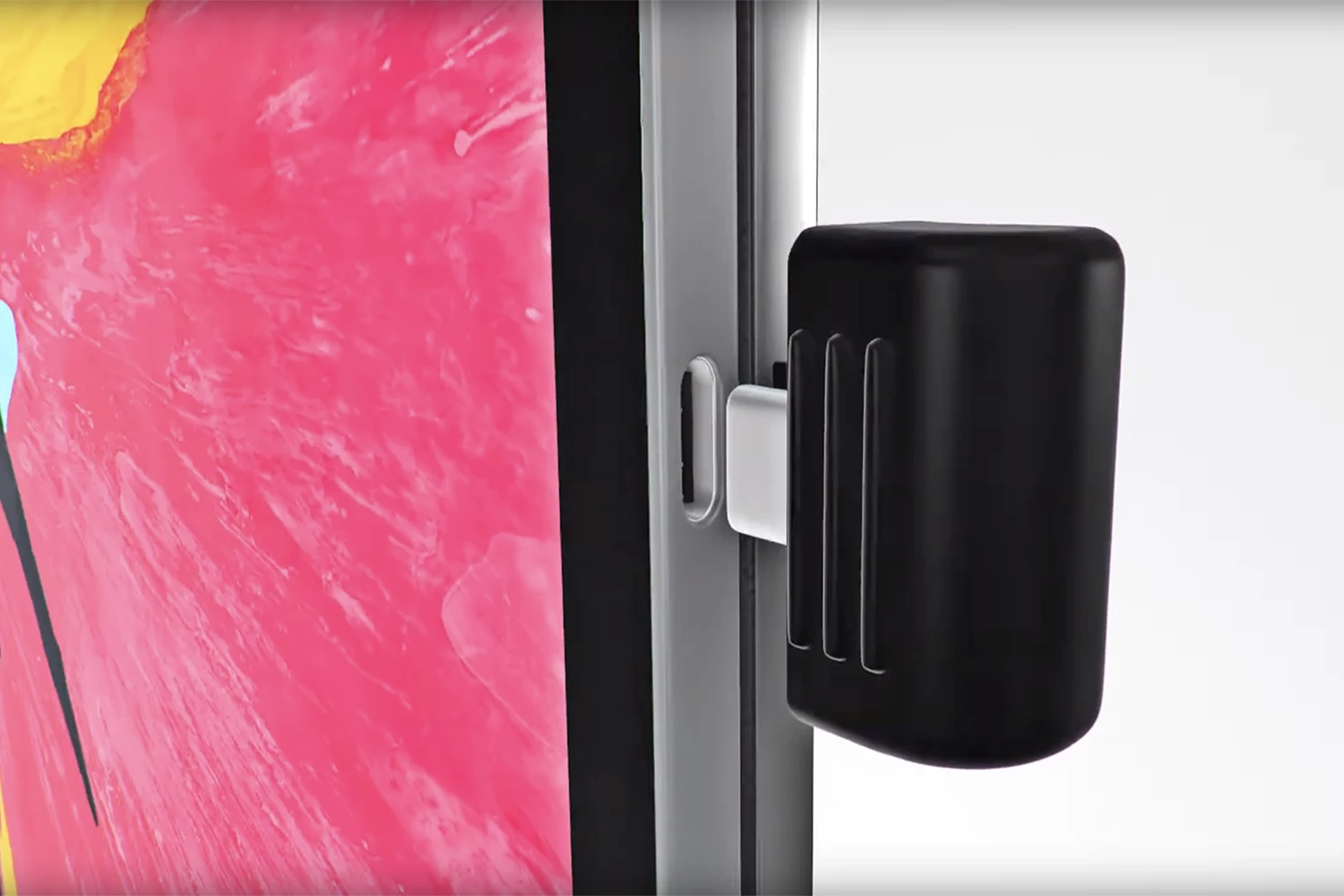 Drop your iPad Pro onto the magnetic plate, push in the USB-C sliding connector and all your peripherals connected to the base are available to you