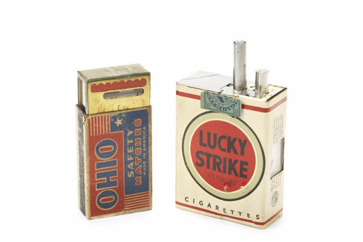The spy camera was disguised as a cigarette pack and the light meter as a match box