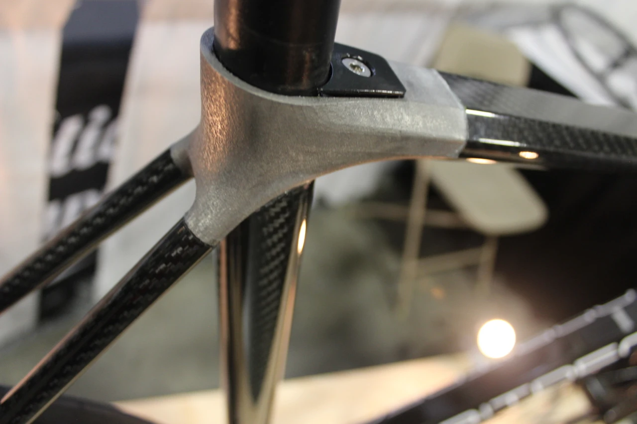 Orbitrec makes bikes with carbon fiber tubes joined together by 3D-printed titanium lugs