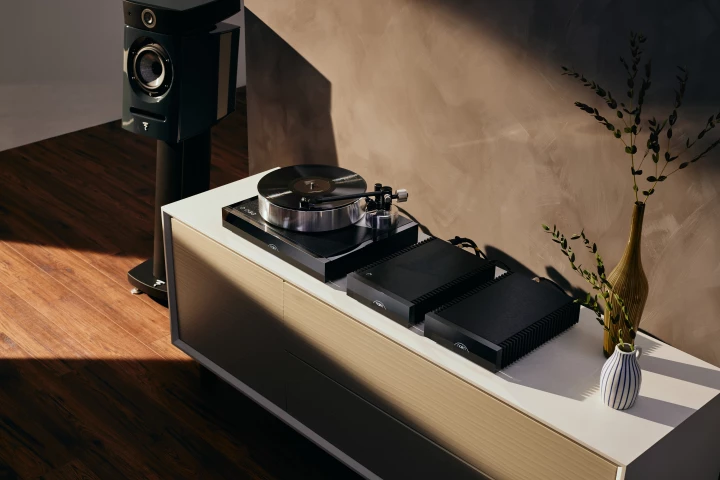 The Solstice Special Edition comprises Naim's first turntable, including a new tonearm and cartridge, a phono stage, a power supply, and a book with a vinyl record