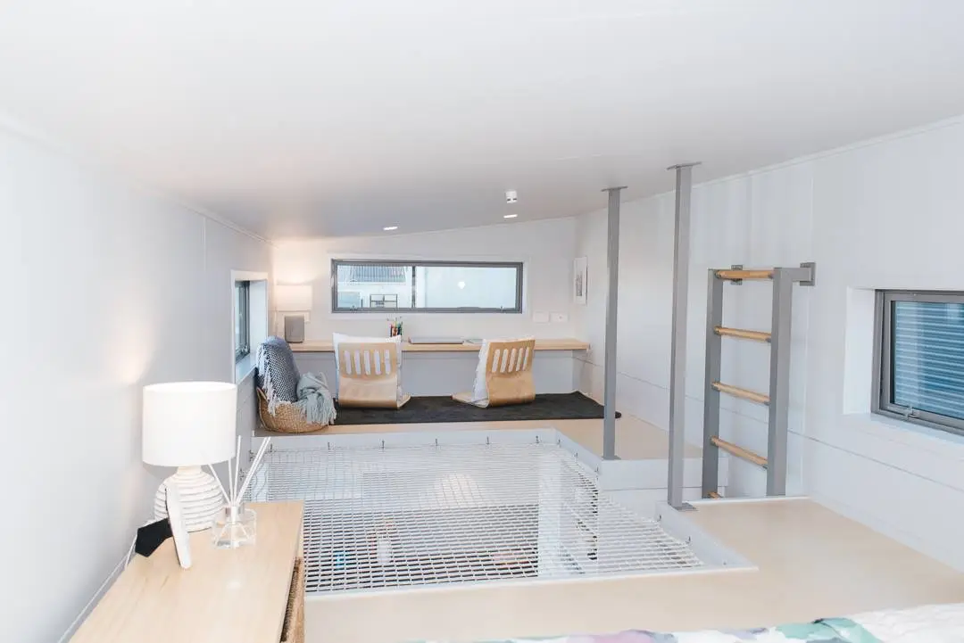View towards the Larissa and Tyler Tiny House's office from the loft bedroom